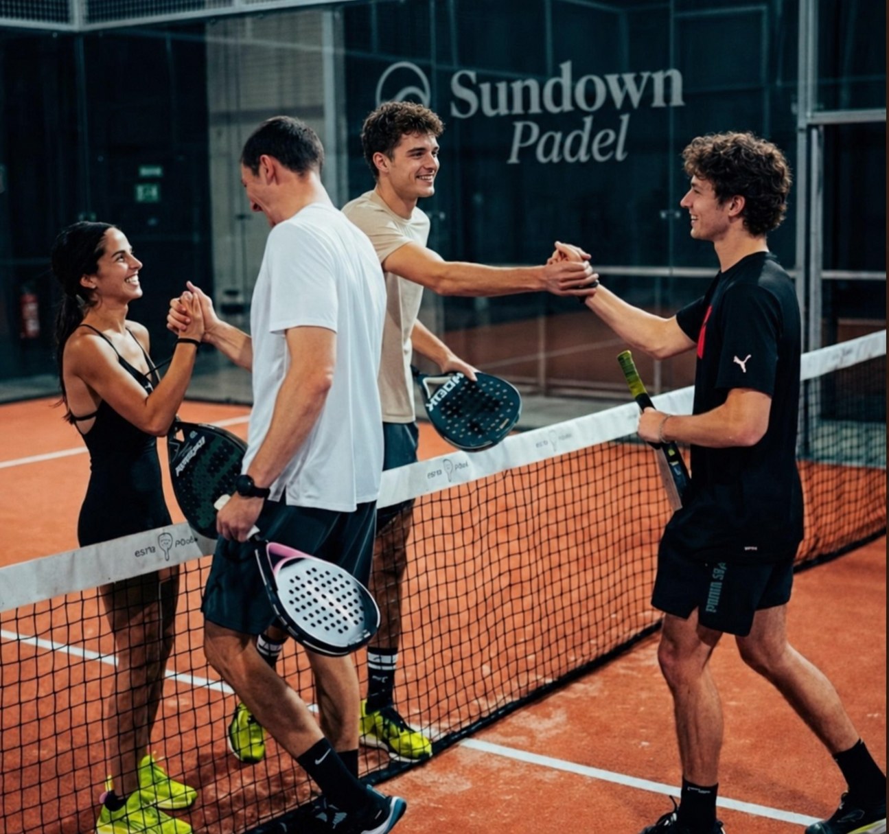 Padel players shaking hands at the net at Sundown Padel Perth